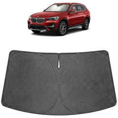 Proadsy sun shade installed in BMW X1 front windshield reduces glare and heat