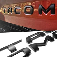 Pukonger front view of matte black tailgate letters showing exact fit and clean look