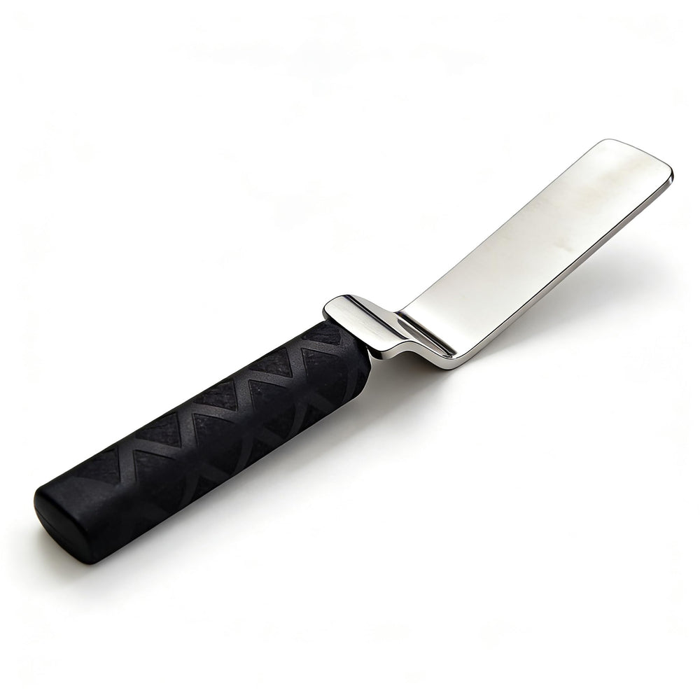 QDentMov slapping spoon front view showing balanced design and accurate strikes