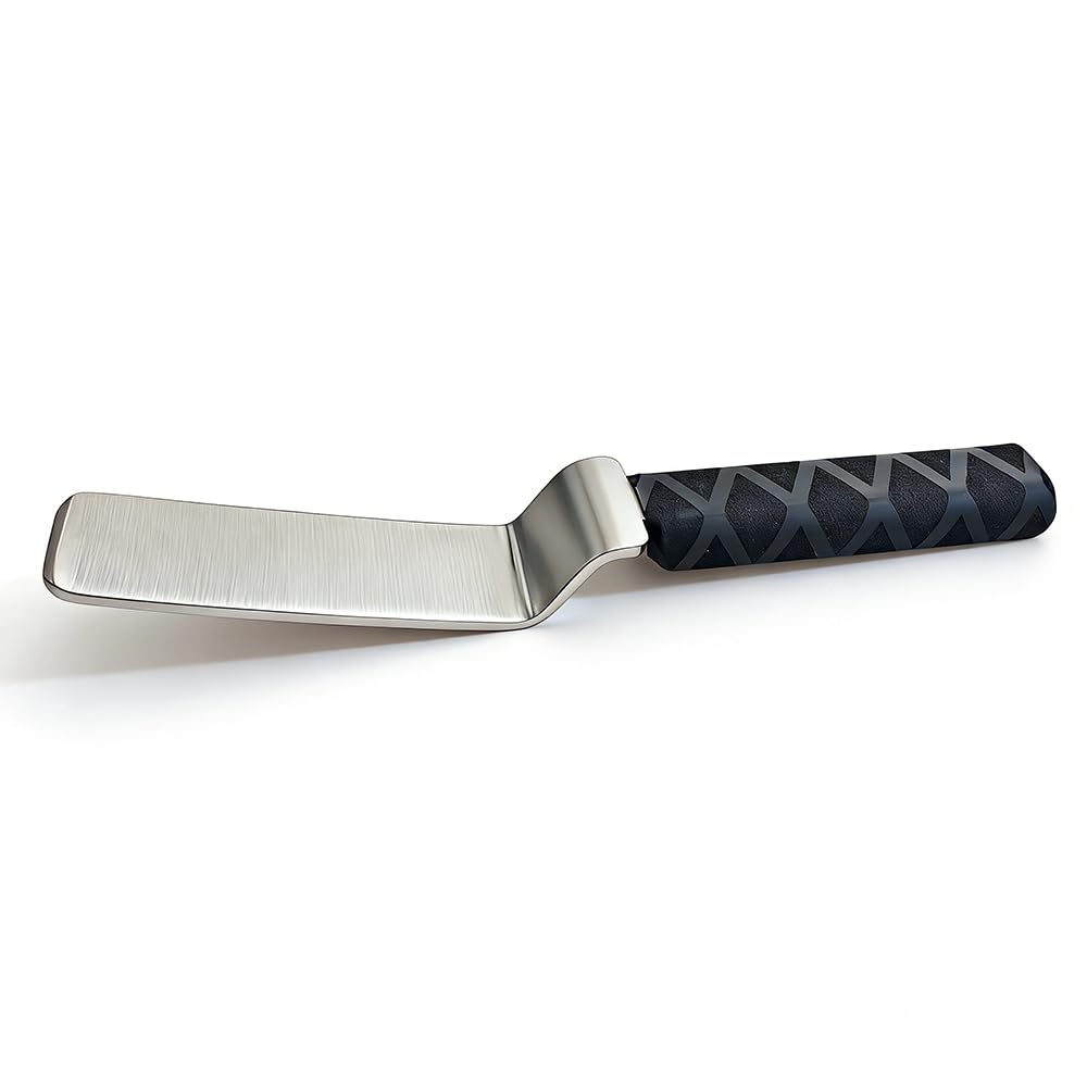 QDentMov spoon head close-up highlighting steel finish and durable edge