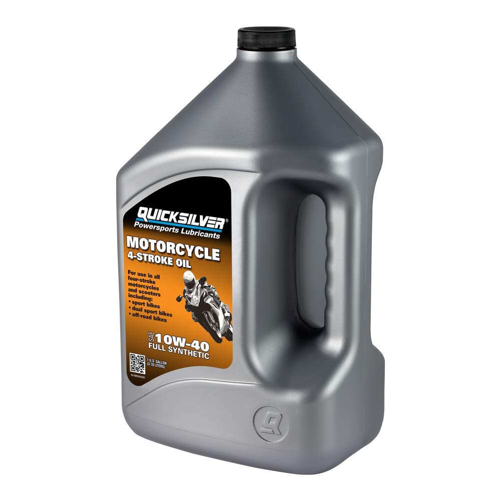 Quicksilver bottle beside parked motorcycle outdoors showing rider-ready reliability