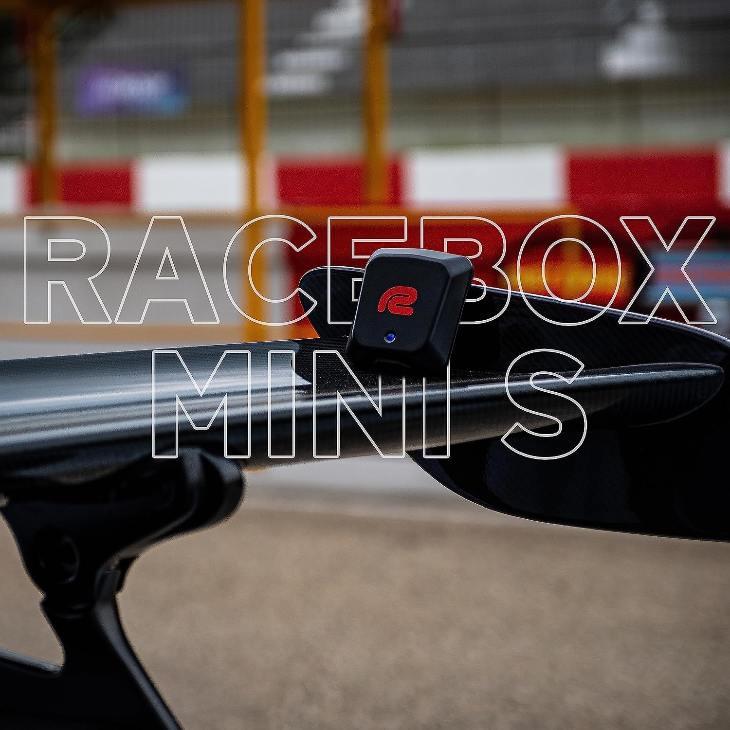 RACEBOX Mini S held in hand for size comparison, portable and unobtrusive benefit