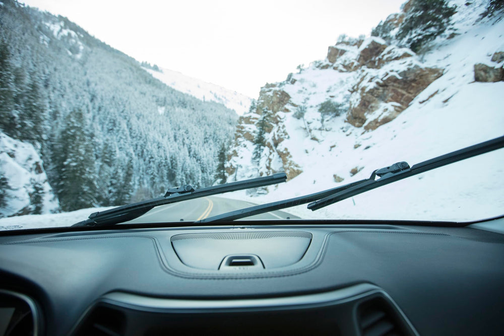 Rain‑X blade installed on car during commute showing reliable all‑weather use