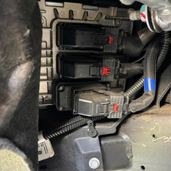 Range Technology RA007 held in hand to show compact size and simple install