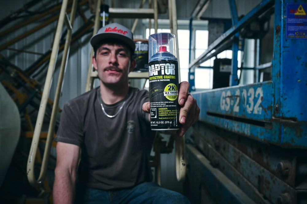 RAPTOR U-POL spraying on truck bed showing easy application and coverage