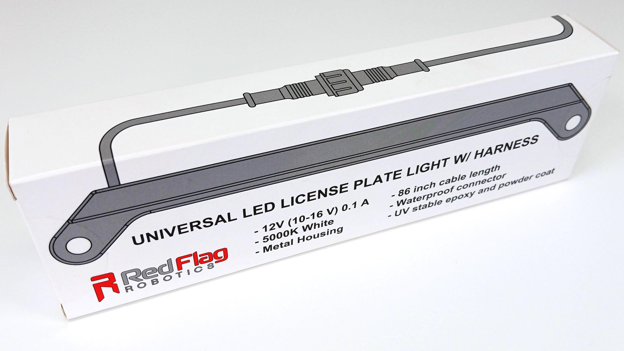 Red Flag Robotics installed on vehicle showing bright plate illumination and improved visibility