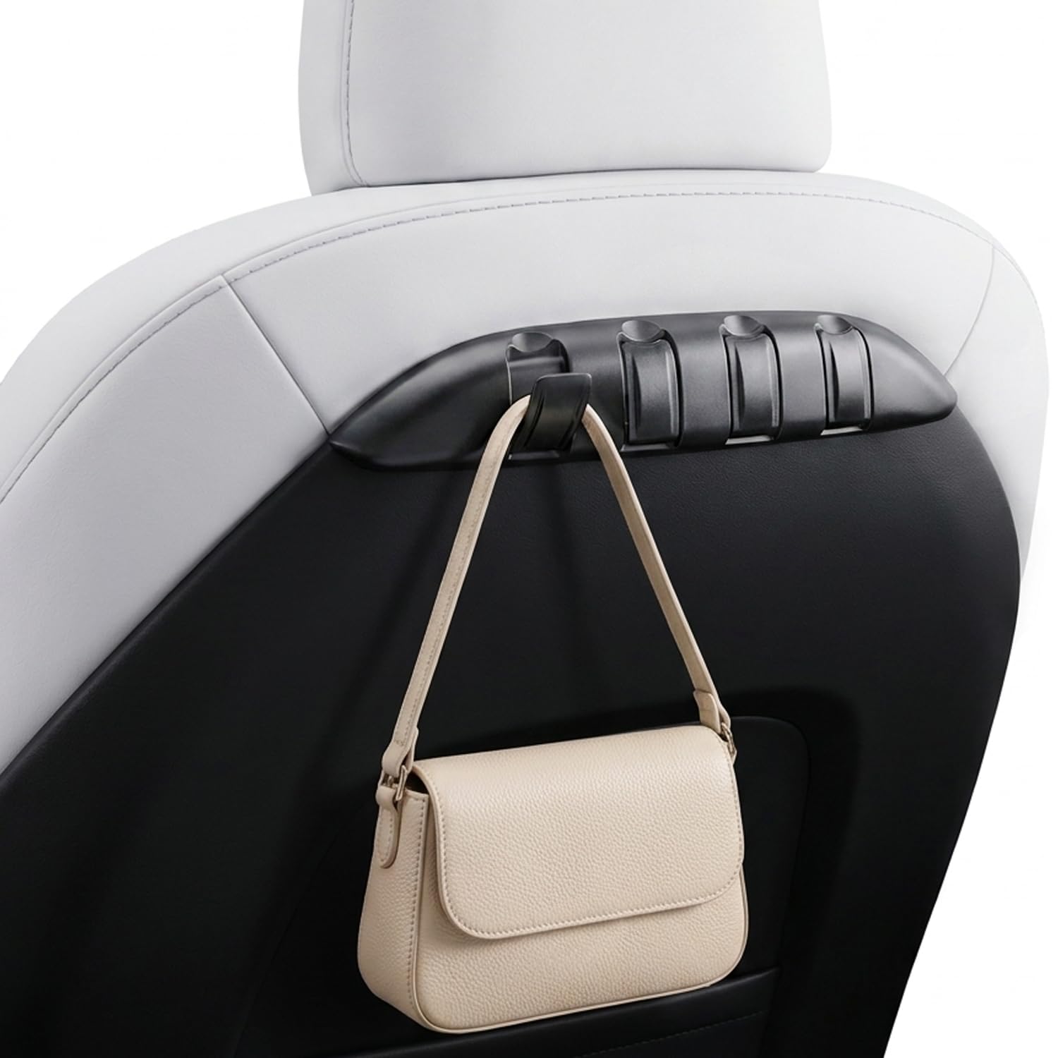 REEVAA hooks installed on Tesla seat back showing tidy storage benefit