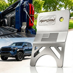 Reform Design front view of silver tailgate lock showing secure cover and fit