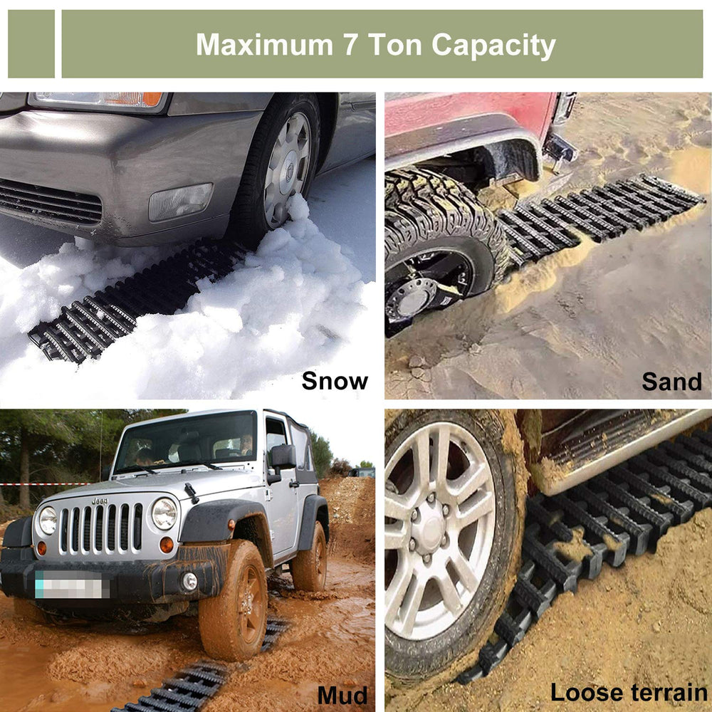 Reliancer tracks placed under tire in mud enabling controlled vehicle recovery