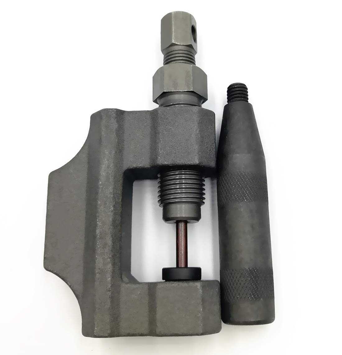 RepairWill chain breaker pressing a rivet on a motorcycle chain for accurate removal