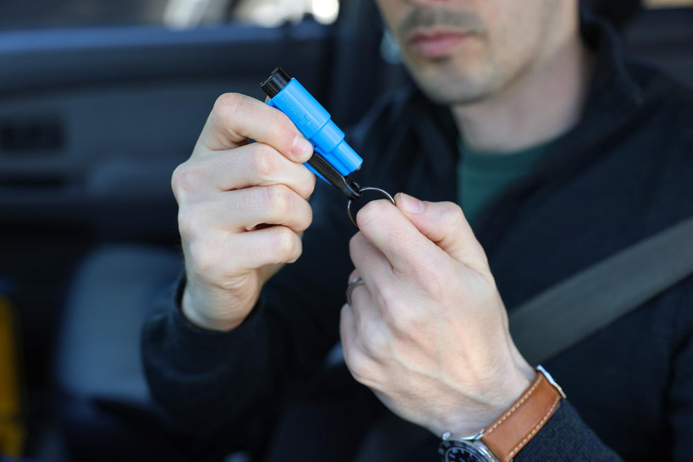RESQME held in hand demonstrating grip for one-handed emergency use