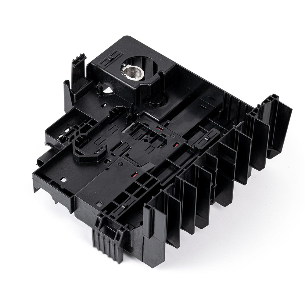 RHAOCZIYAUTO fuse block staged in garage setting illustrating professional replacement readiness