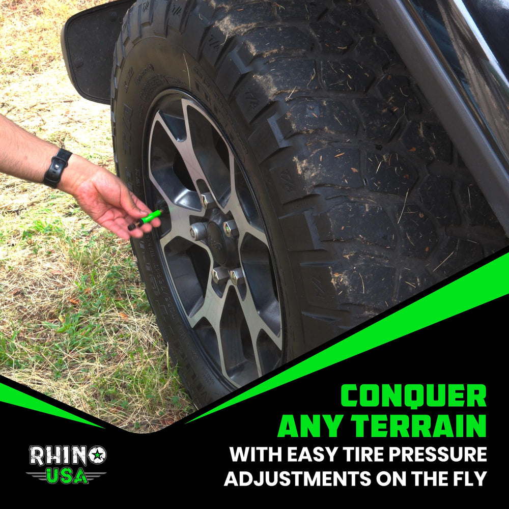 Rhino USA deflators installed on a vehicle at the beach illustrating improved traction and flotation