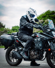 RIDEIRON close-up of waterproof fabric demonstrating heavy rain protection