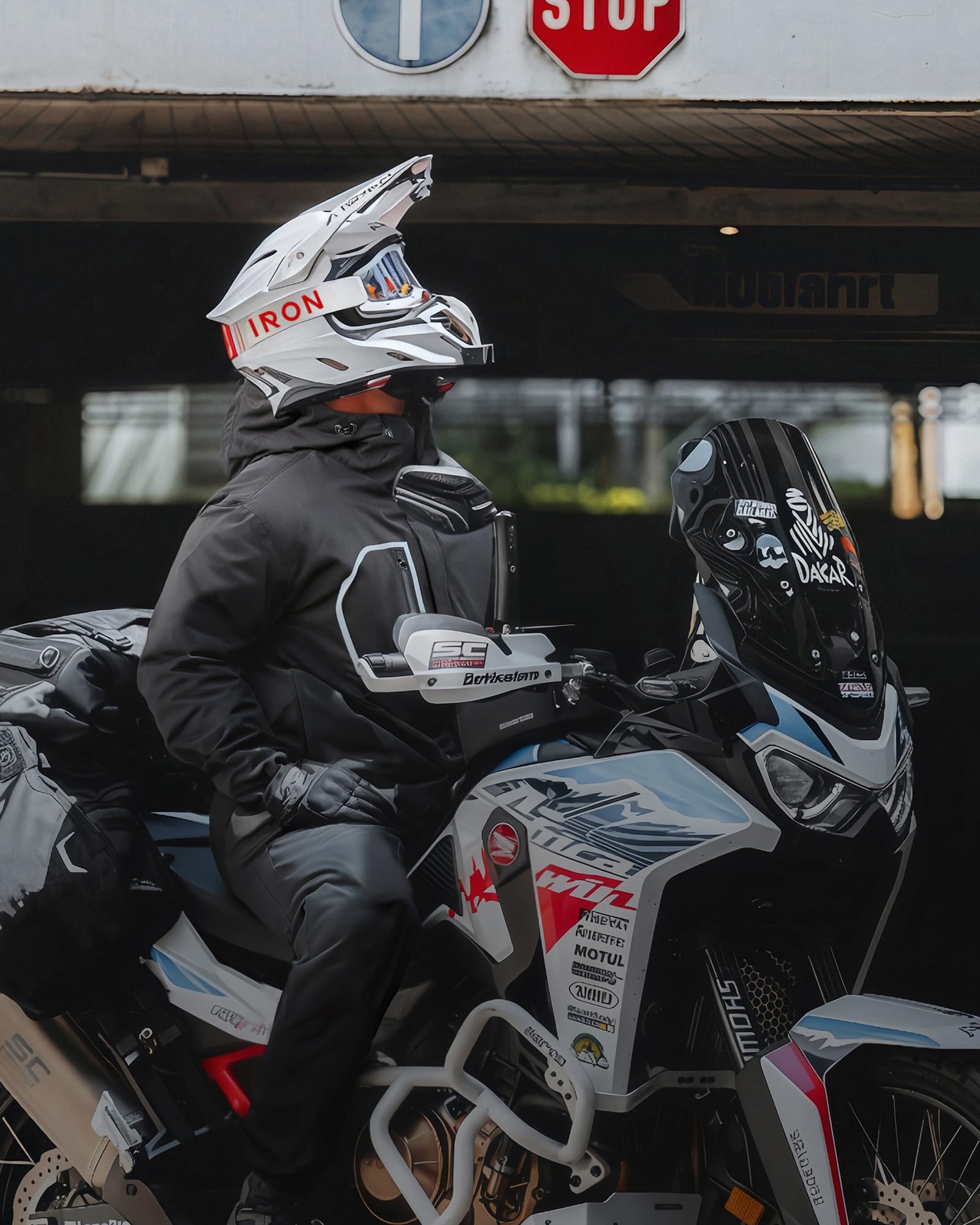RIDEIRON commuter on bike in rain illustrating real-world protection benefit
