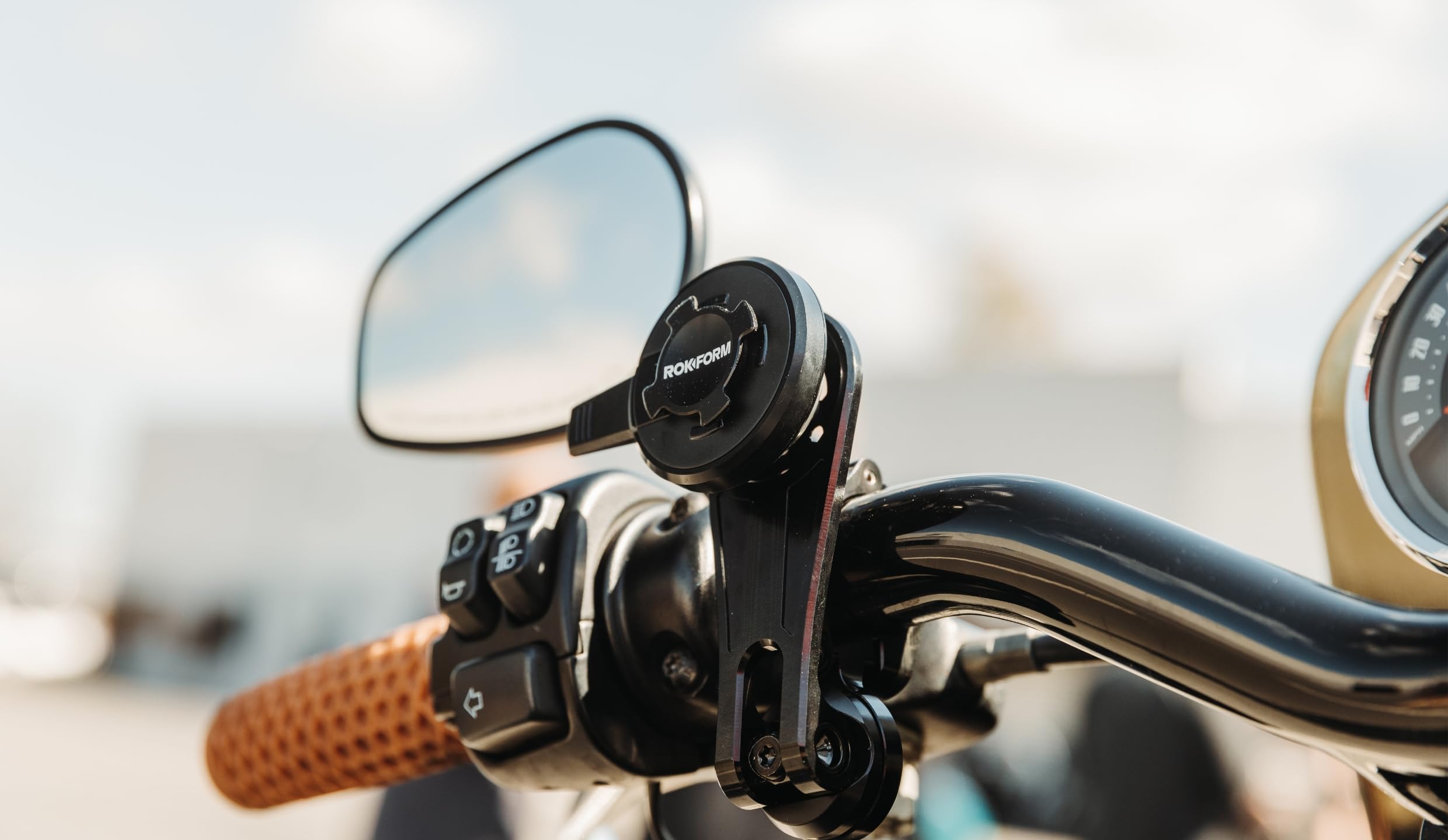 Rokform side profile of dampener highlighting low‑profile design and secure attachment benefit