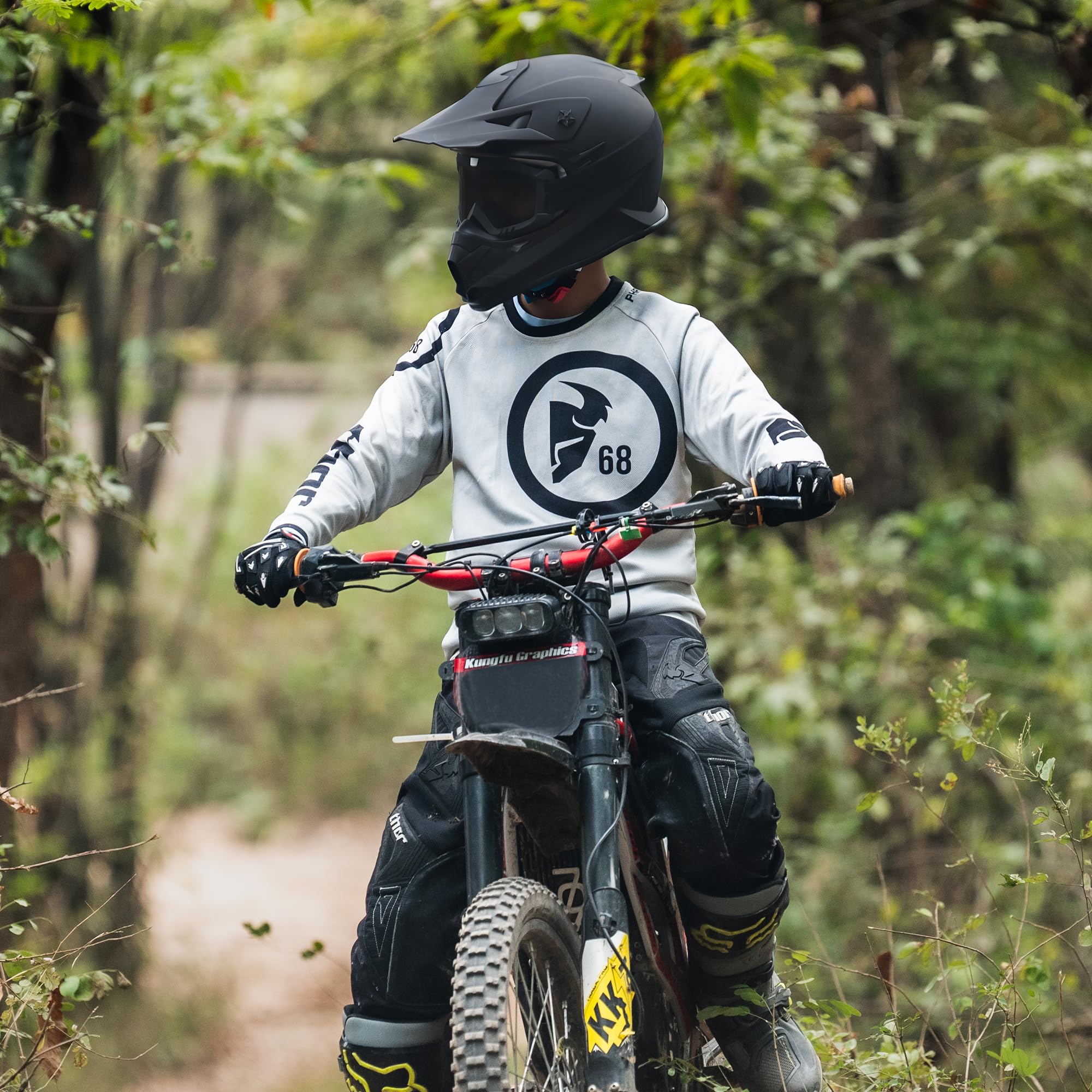 Roozo helmet worn by child rider demonstrating real-world protection