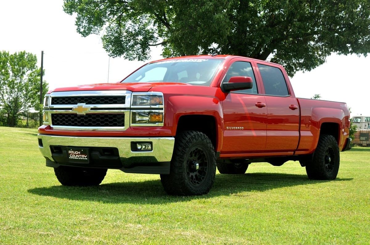 Rough Country kit installed on truck front providing level stance and clearance