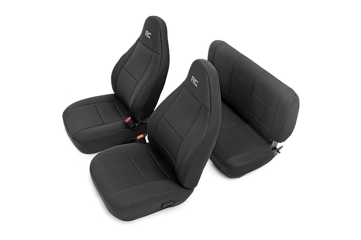 Rough Country front seat covers installed showing protective fit and renewed cabin look
