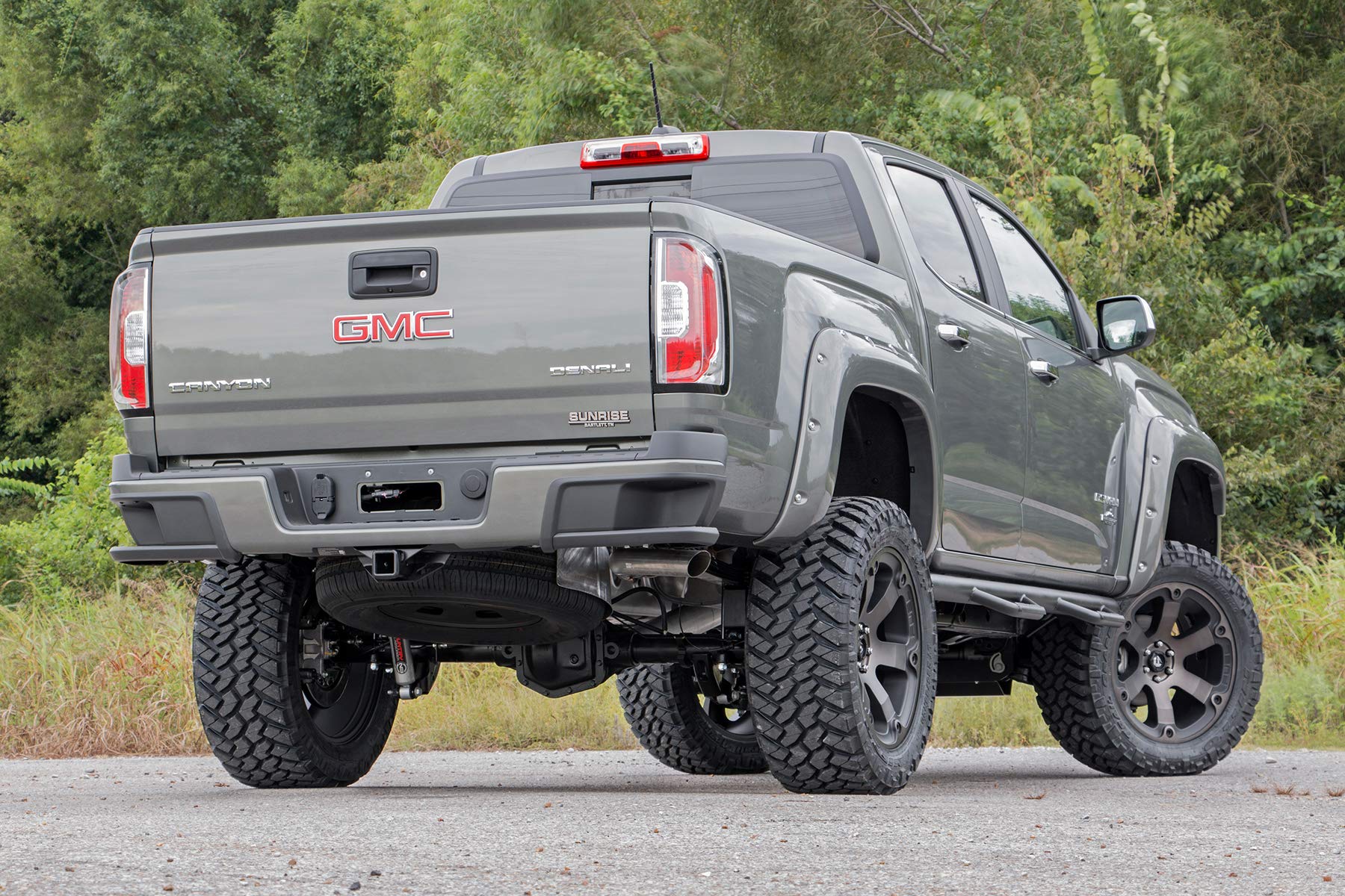 Rough Country shocks on lifted truck off-road showing improved control