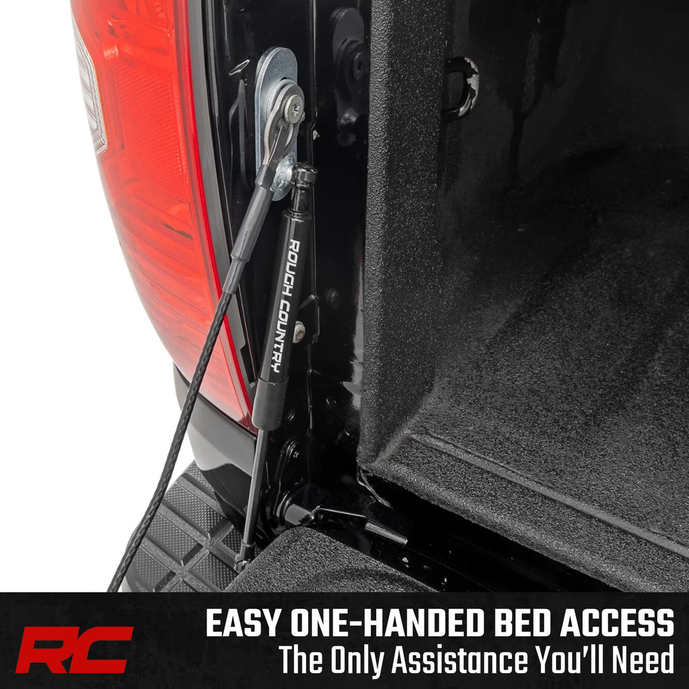 Rough Country tailgate assist mounted on a Tundra demonstrating controlled lowering benefit