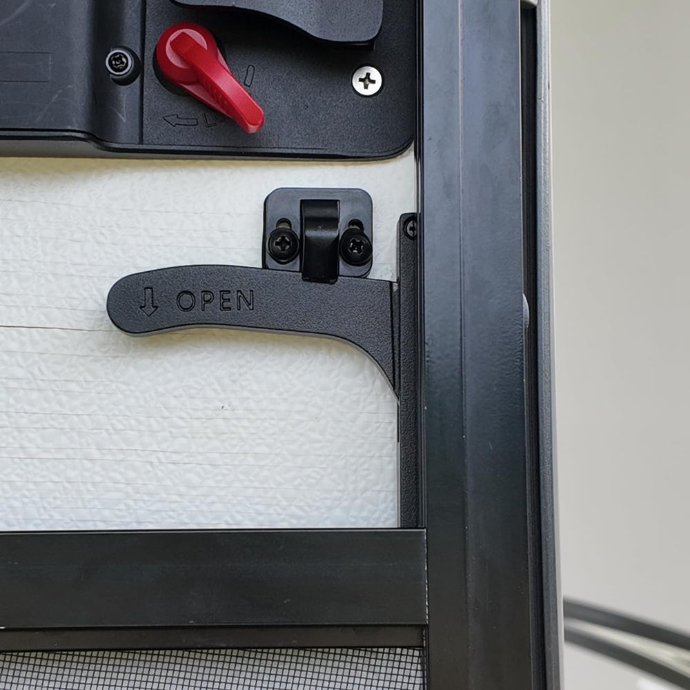Safoner handle mounted on RV screen door demonstrating easy operation and fit