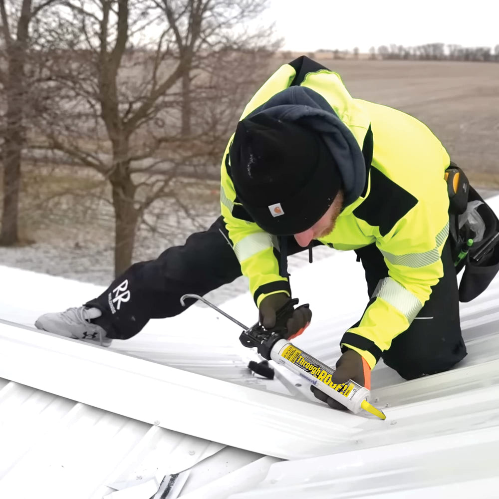 Sashco Through The ROOF used on a gutter repair in rain showing reliable wet-surface adhesion