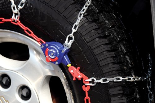 SCC Auto-Trac on a parked SUV in snow emphasizing reliable winter control
