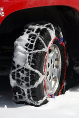 SCC Auto-Trac installed on SUV tire showing improved traction on snowy road
