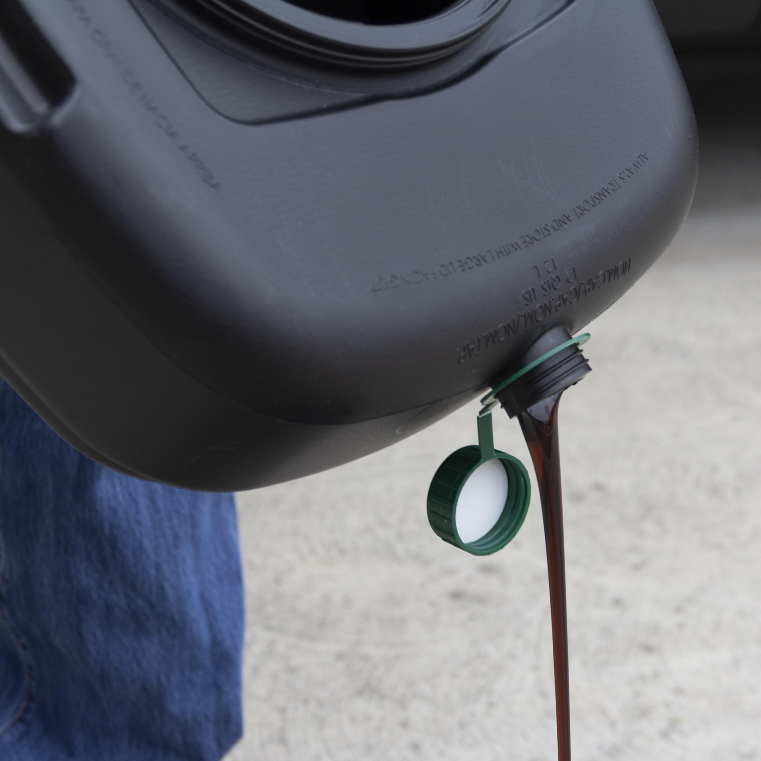 Scepter pan next to recycling jug showing 12-quart capacity benefit