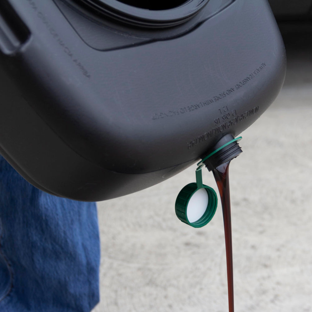 Scepter pan next to recycling jug showing 12-quart capacity benefit