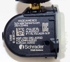 Schrader sensor connected to programming tool illustrating easy technician setup
