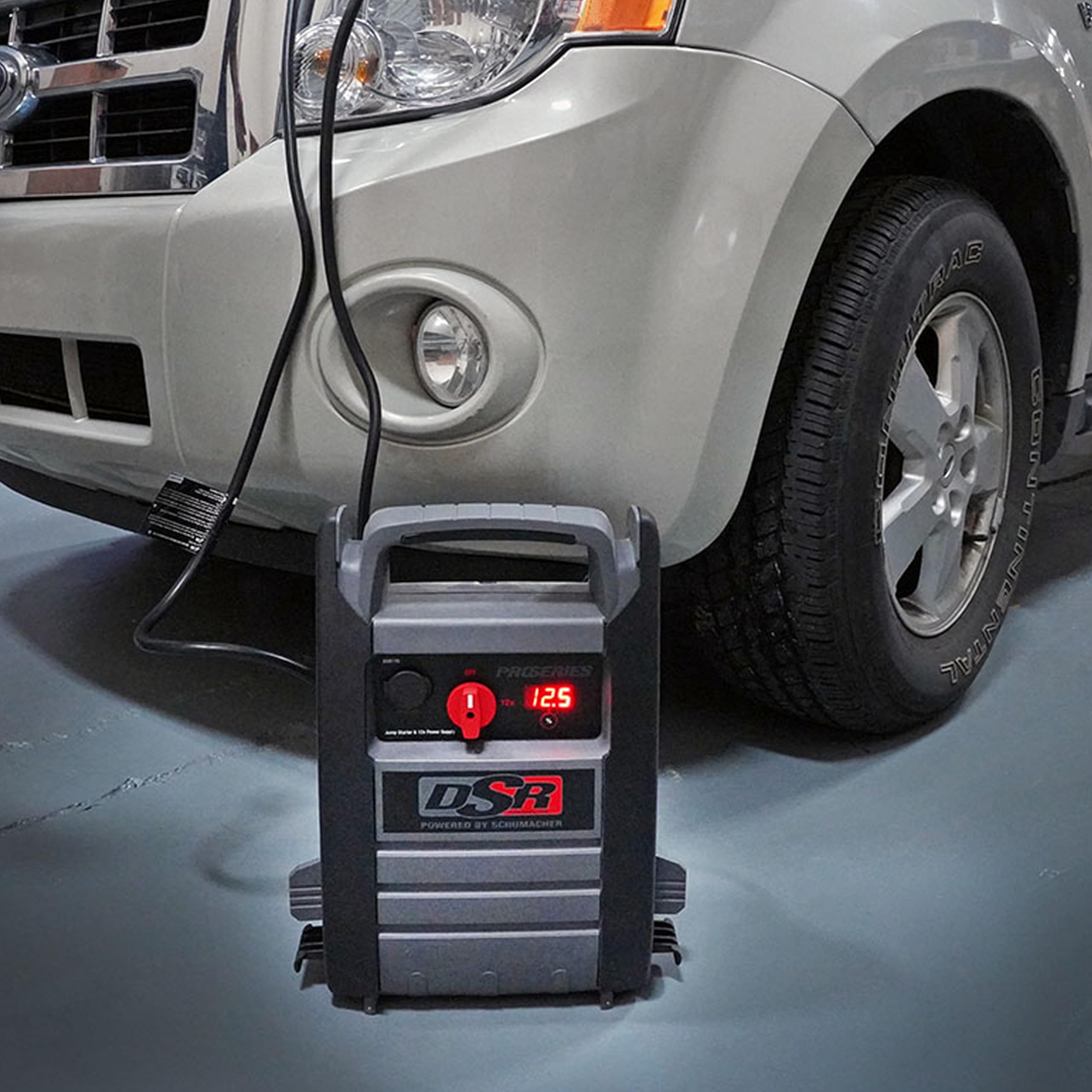 Schumacher DSR167 AC outlets and USB port powering tools and charging phones