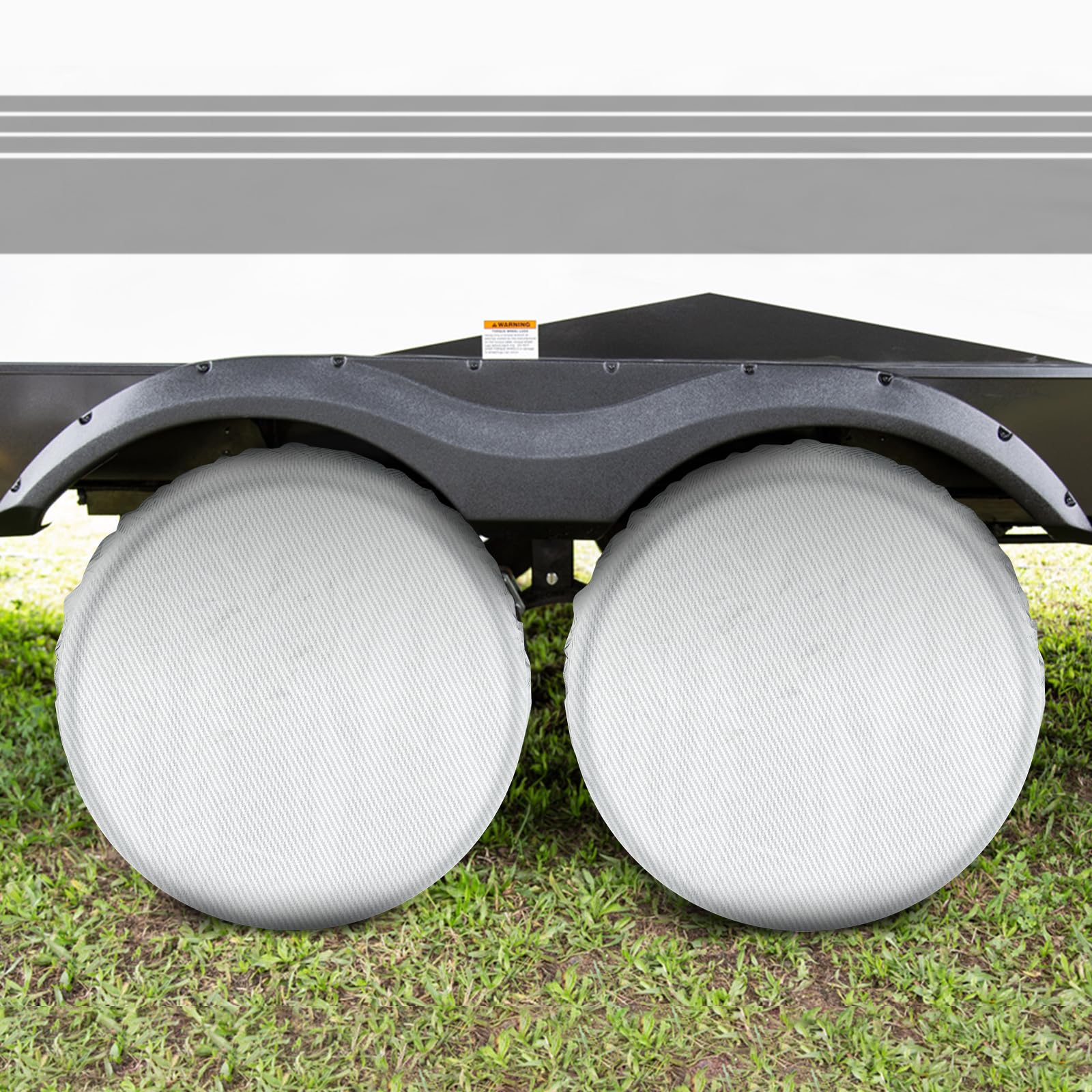 Season Guard covers on camper at campsite showing outdoor protection and clean appearance benefit