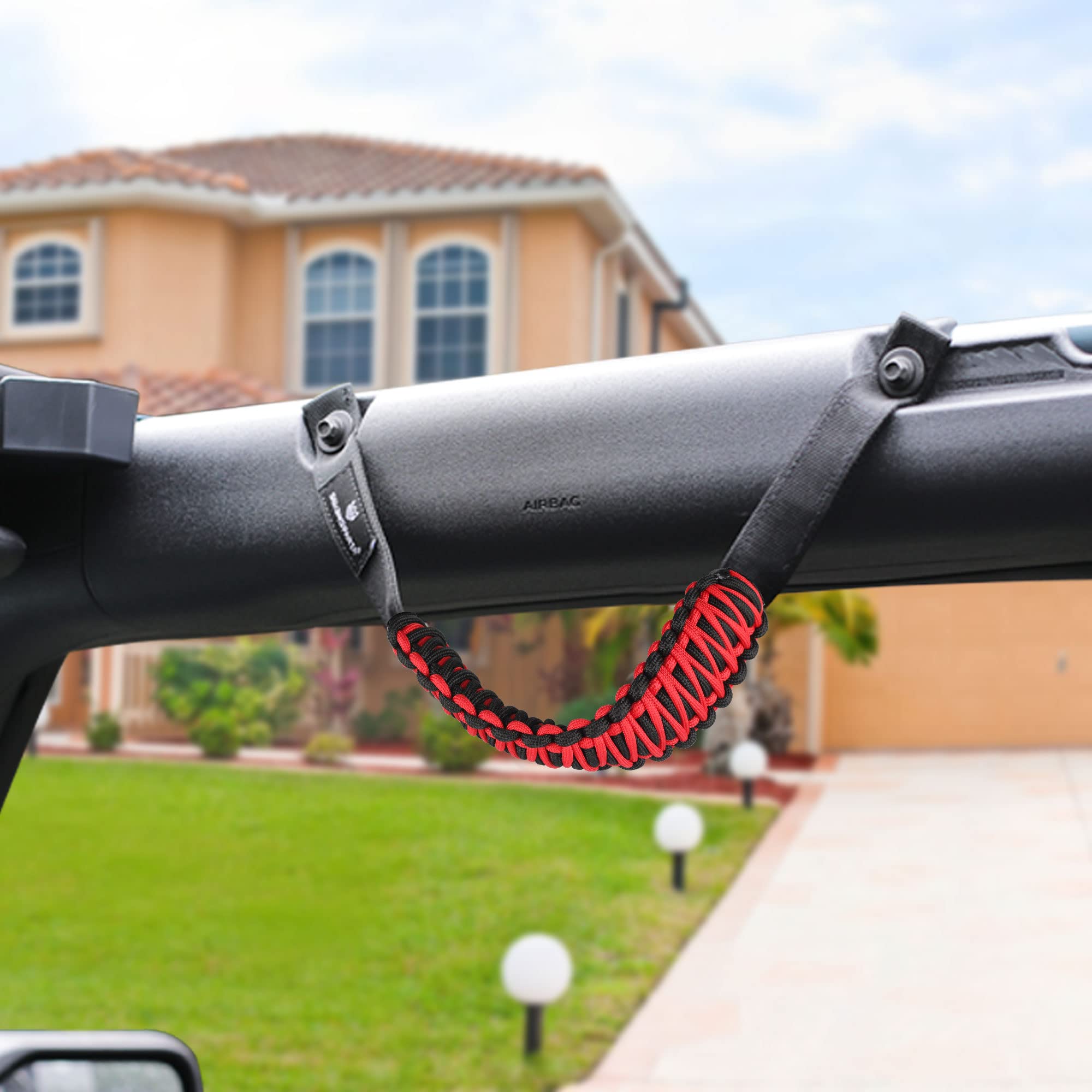 SEVEN SPARTA handle held by hand to show scale and comfortable grip