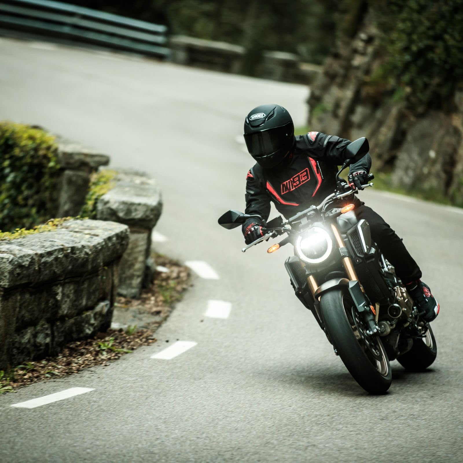 Shoei RF-1400 on a rider demonstrating real-world stability and noise reduction
