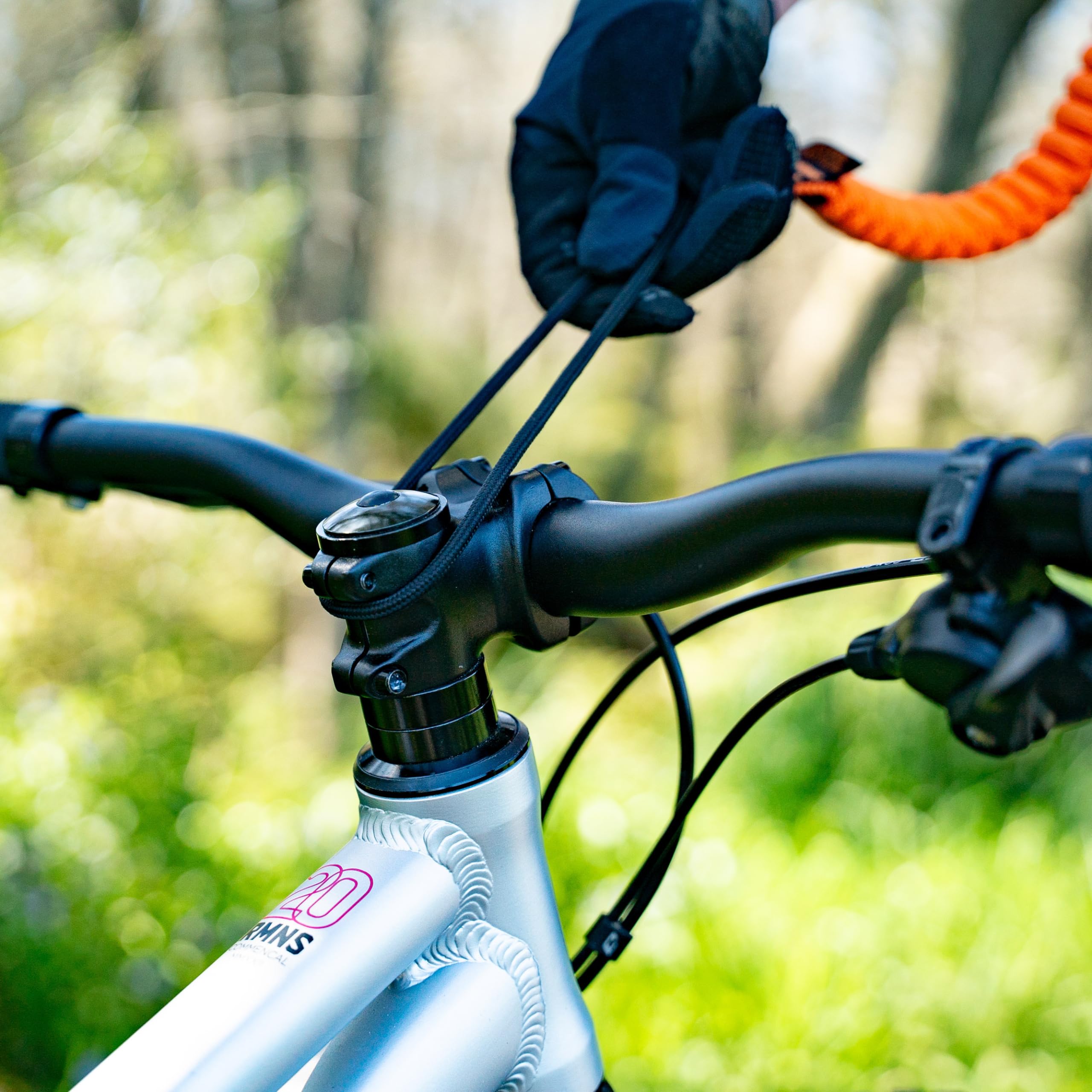 SHOTGUN rope in use with adult towing child on trail showing easier riding