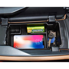 SKTU coin and sunglasses compartments keeping small items separate and secure