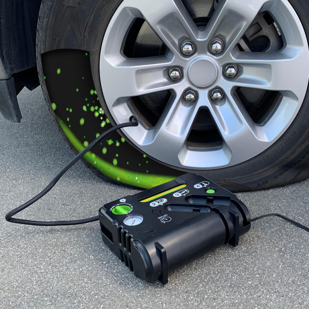 Slime inflator plugged into car 12V socket powering a quick one-person repair benefit