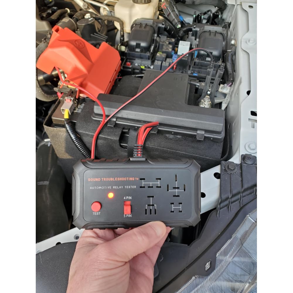 Sound Troubleshooting tester in use on a workbench diagnosing a vehicle relay quickly