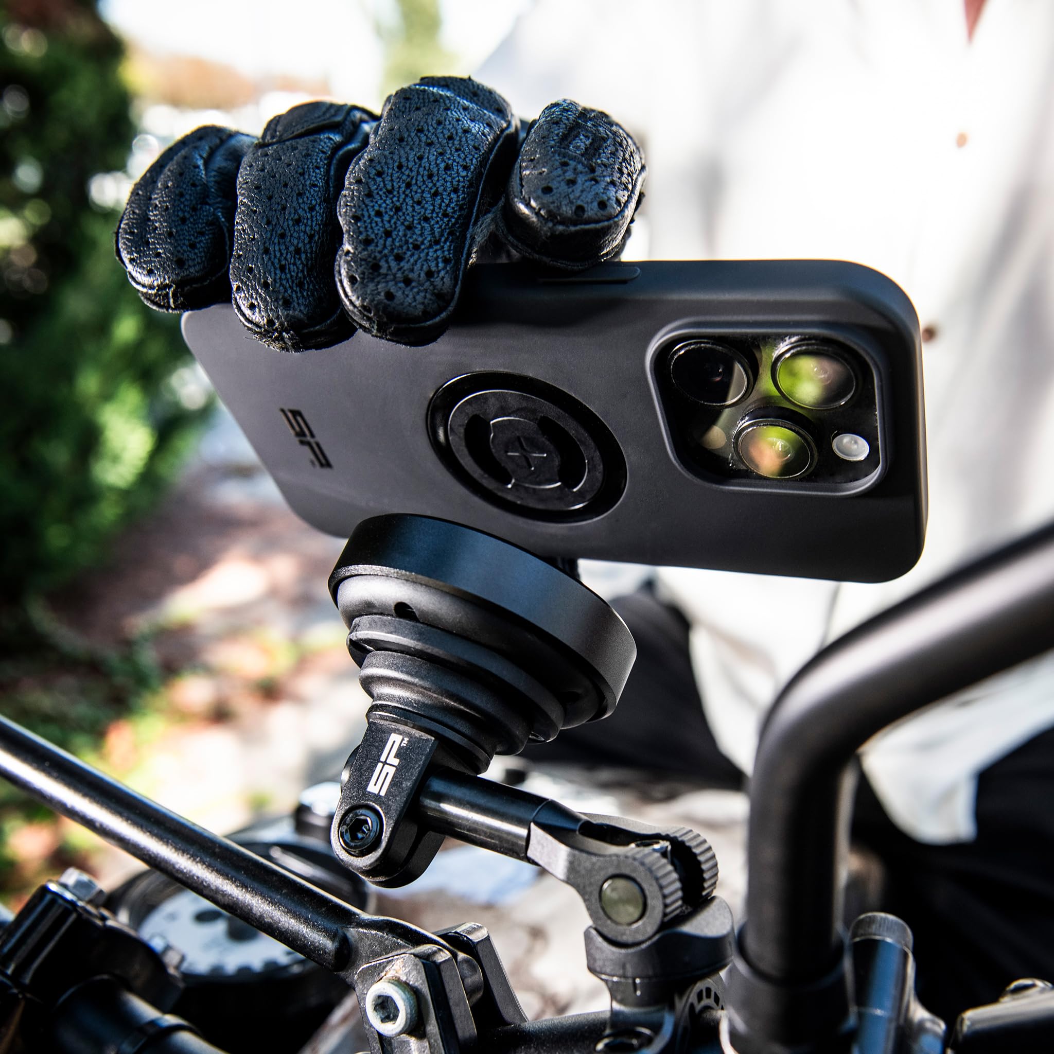 SP CONNECT SPC+ with phone in portrait offering clear route visibility