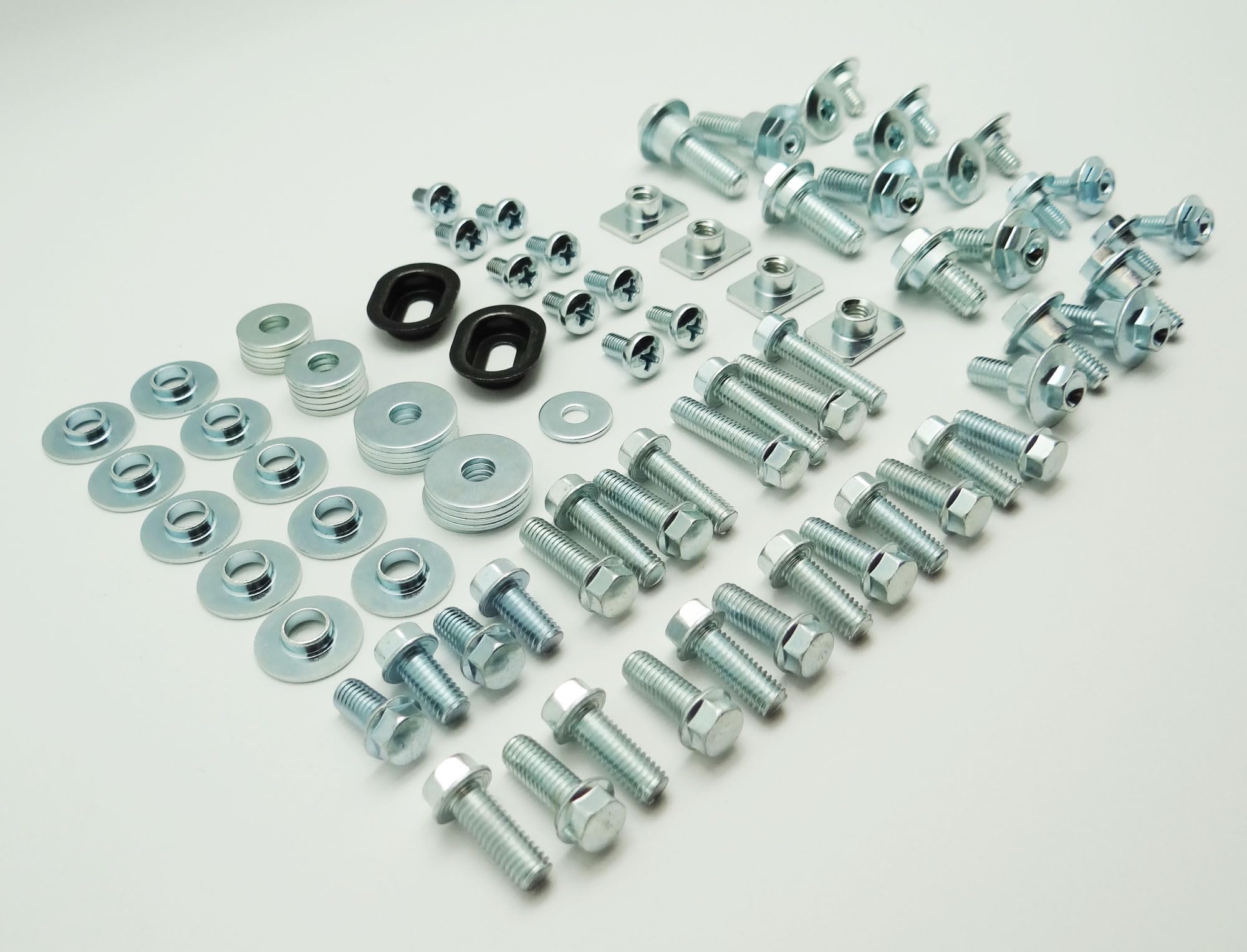 Specbolt seat bolts and square nut beside ruler for scale showing correct sizing benefit