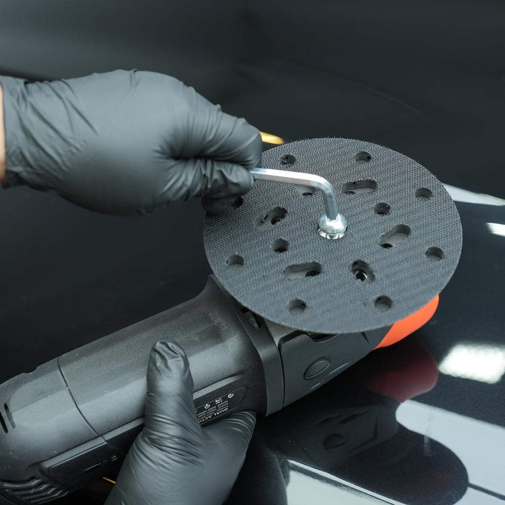 SPTA plate next to DA polisher showing scale and fit for up to 12,000 OPM machines