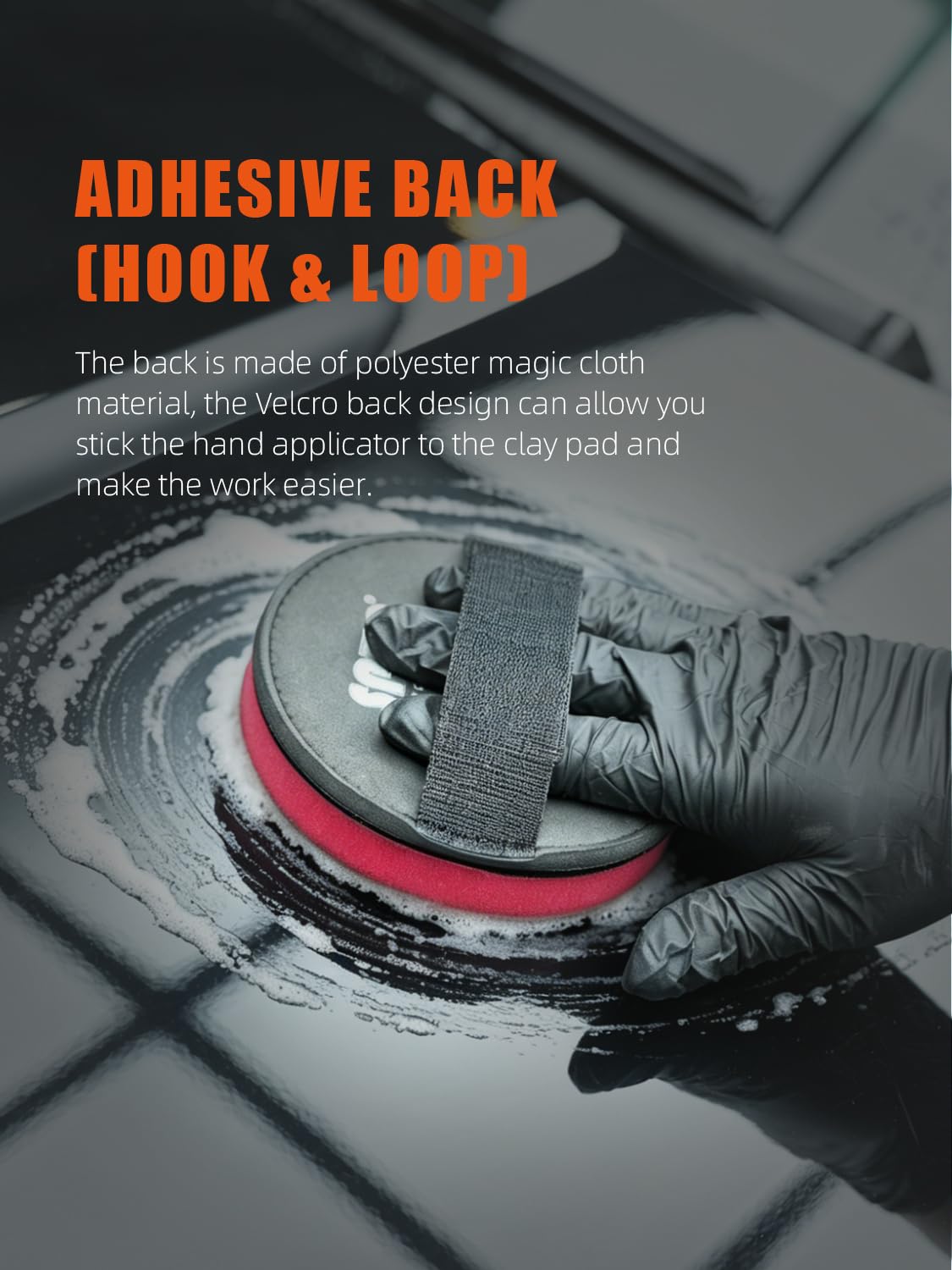 SPTA clay pad in handheld use removing contaminants and smoothing paint