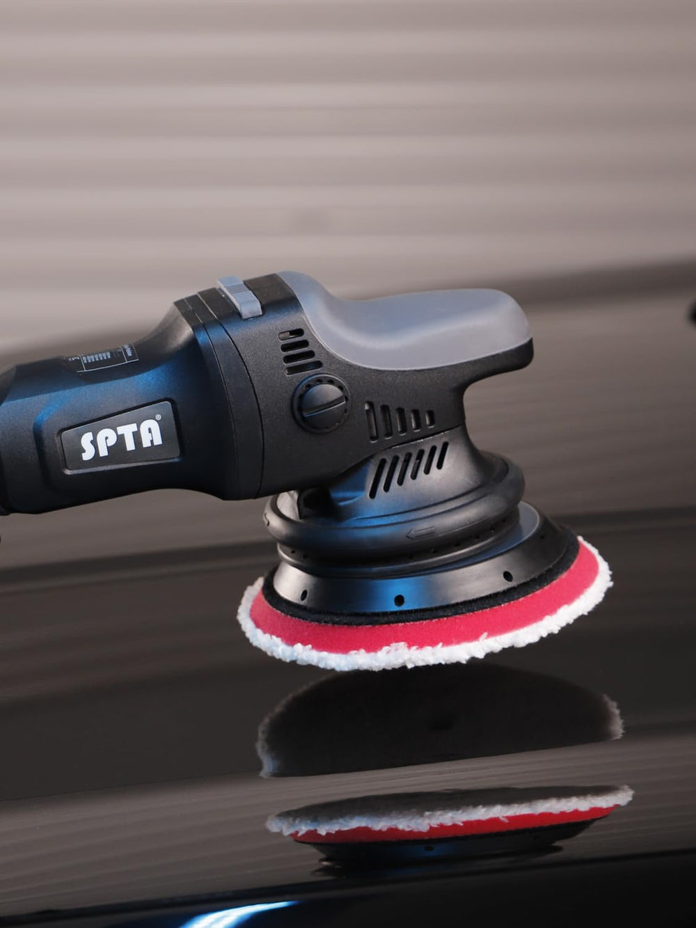 SPTA pads next to ruler showing true 125mm size and fit benefit