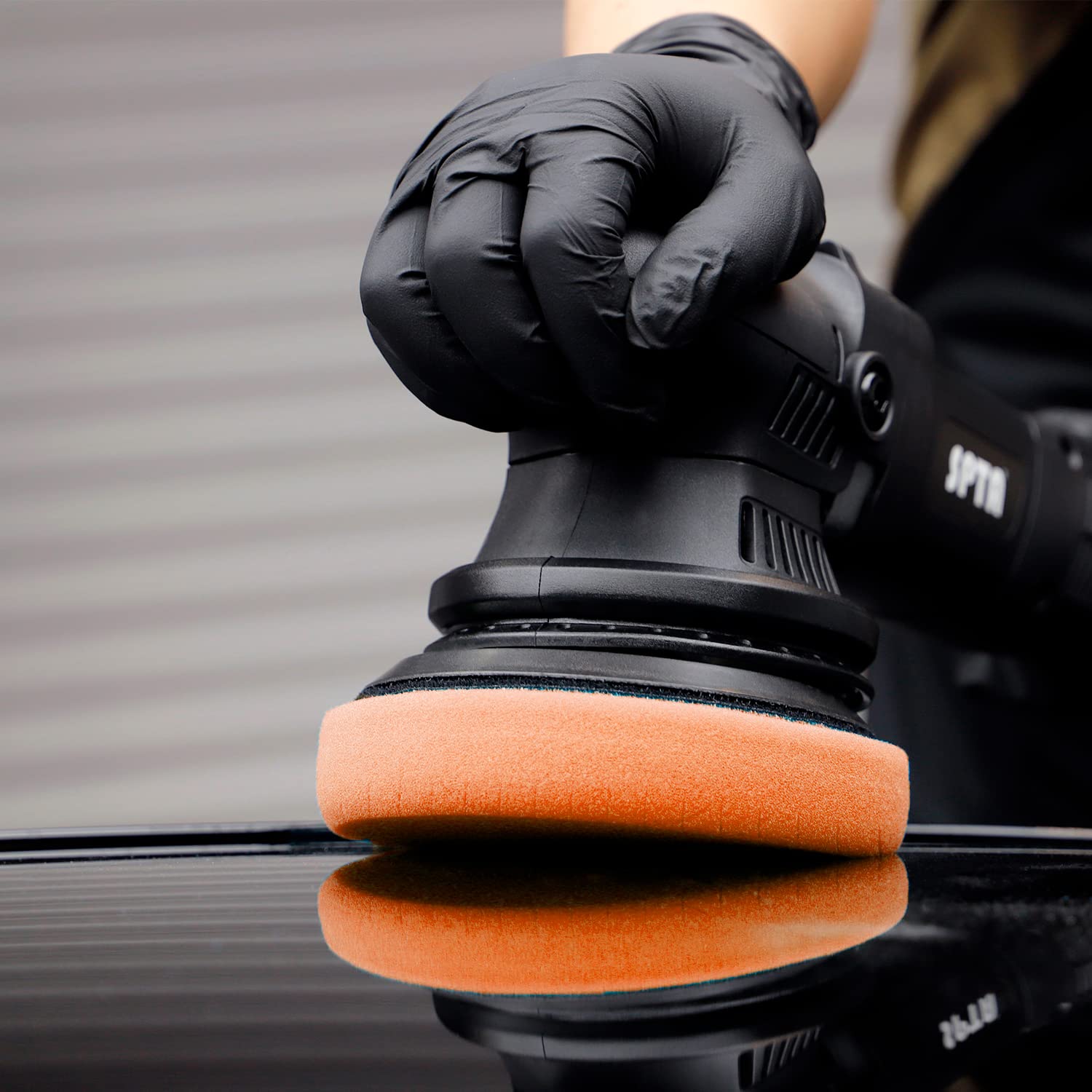 SPTA T40 polishing a car hood showing finish improvement and versatility