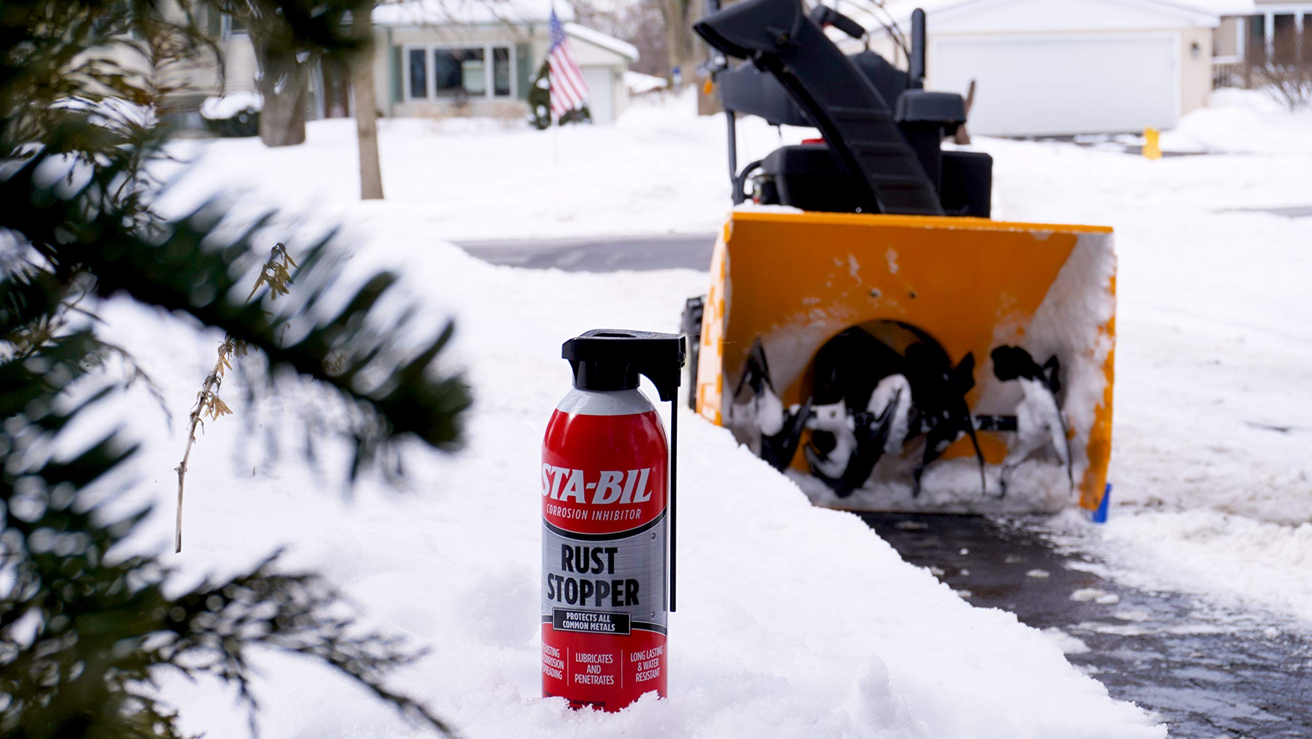 STA-BIL Rust Stopper spray close-up demonstrating flip-top sprayer for precise application