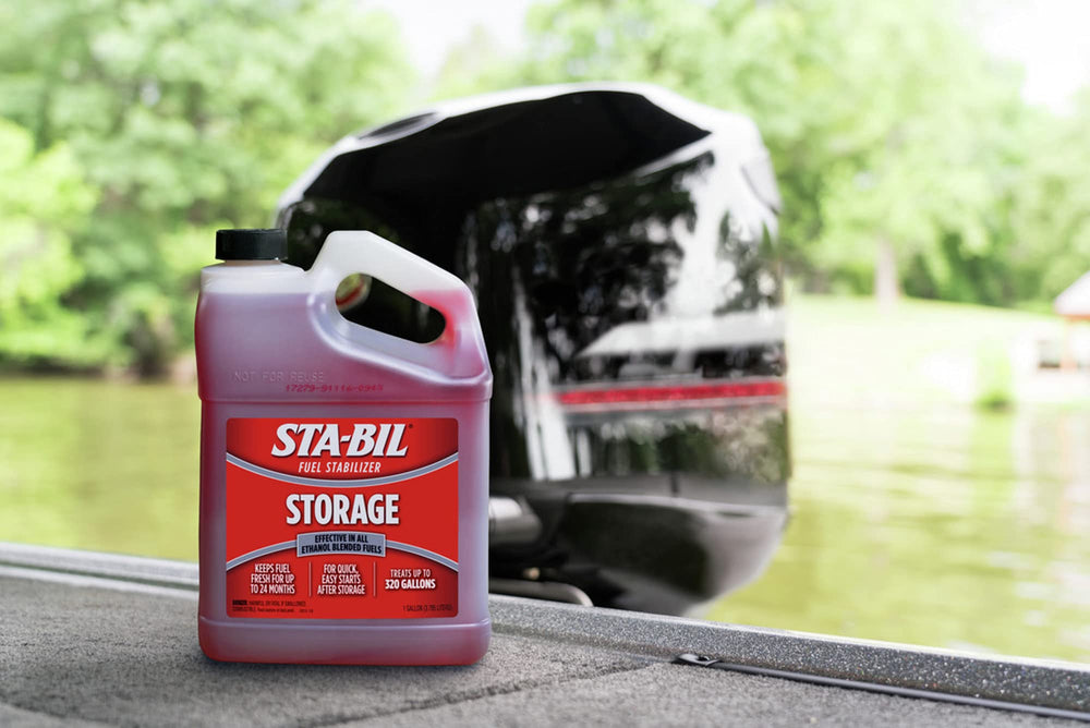 STA-BIL bottle next to a ruler demonstrating the one-gallon size for storage