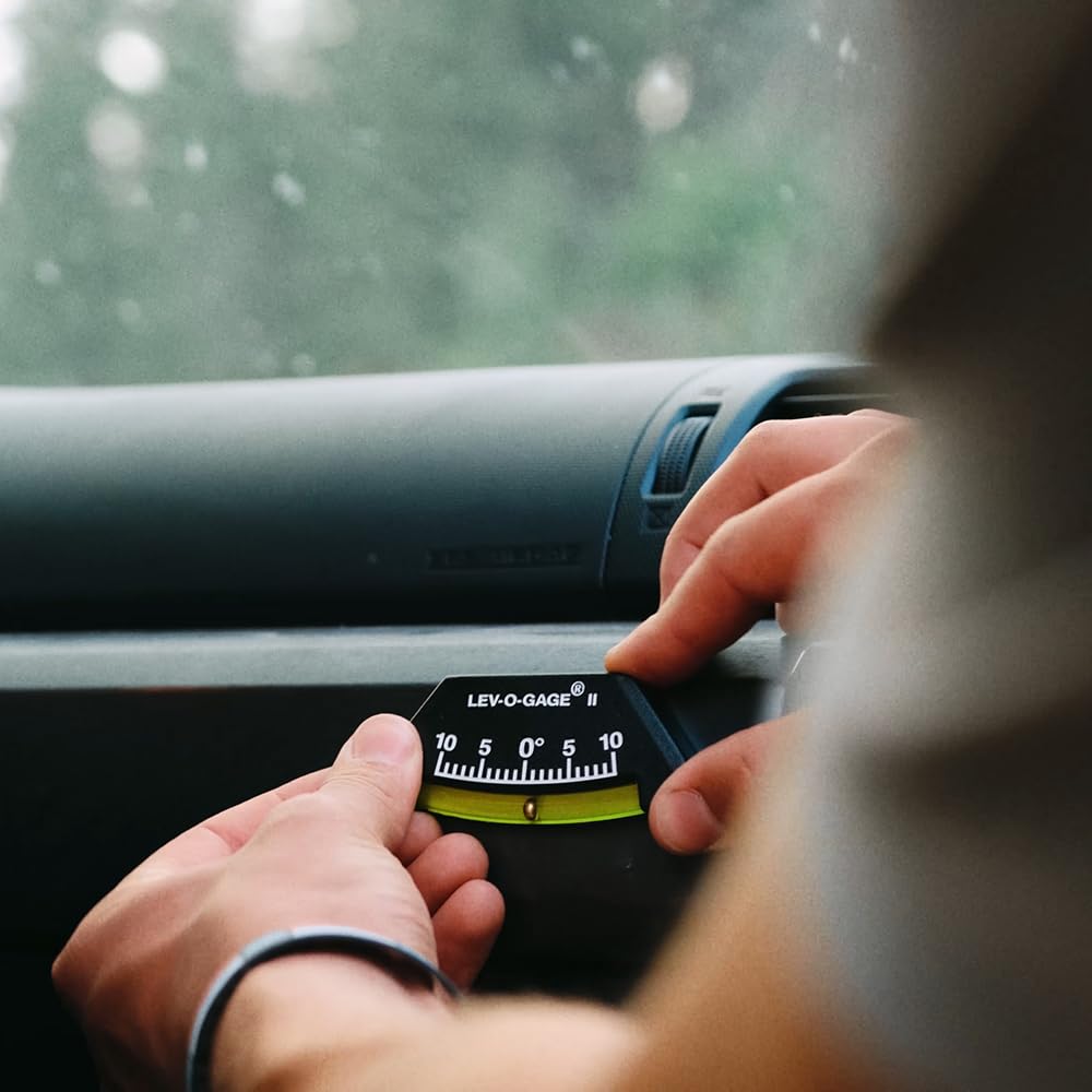 Sun Company lev-o-gage II installed on interior dashboard for quick in-cabin leveling reference