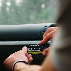 Sun Company lev-o-gage II installed on interior dashboard for quick in-cabin leveling reference